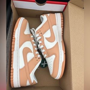 Brand New Woman’s Nike Dunk Low sneakers.